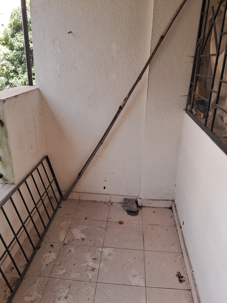 Balcony, sukanto-roy-surobhi-enclave 2 Bedroom 890 Sq.Ft. Apartment In Aundh Pune 8272109