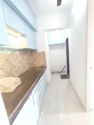Kitchen in 1 BHK Apartment at Dedhia Platinum Lawns, Ghodbunder Road – for Rent