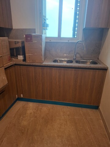 Kitchen in 3.5 BHK Builder Floor at Ambience Creacions, Sector 22 – for Rent