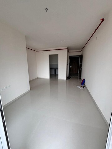Living Room in 2 BHK Apartment at Rustomjee Urbania, Majiwada – for Sale