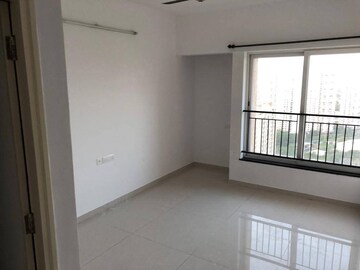 Bedroom in 2 BHK Apartment at Rustomjee Urbania, Majiwada – for Sale