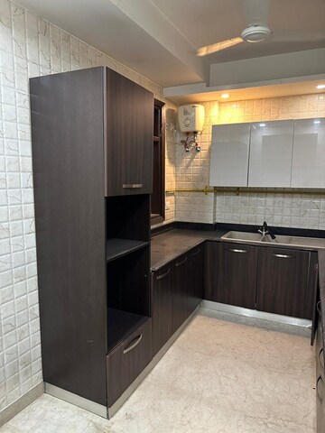 Kitchen in 3 BHK Builder Floor at Gulmohar Park – for Sale