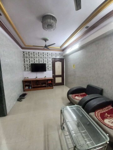 Living Room in 1 BHK Apartment at New Krishna Tower, Kopar Khairane – for Rent