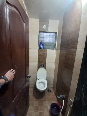 Bathroom in 1 BHK Apartment at New Krishna Tower, Kopar Khairane – for Rent