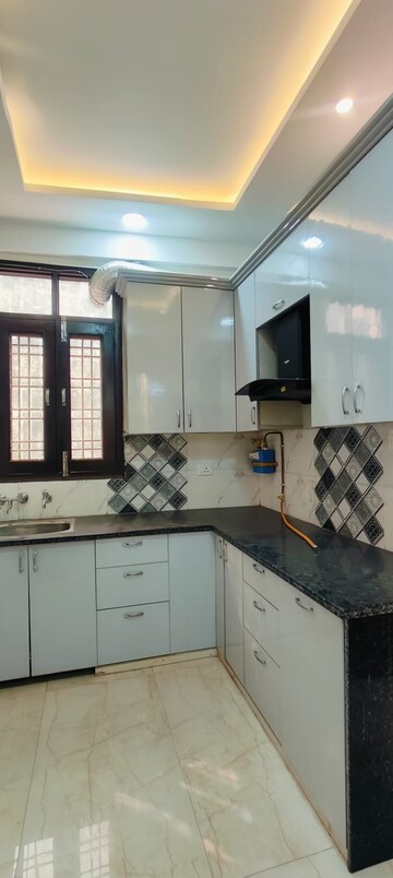 Kitchen in 3 BHK Apartment at Windsor Paradise 2, Raj Nagar Extension – for Rent