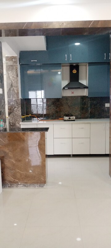 Kitchen in 2.5 BHK Apartment at Prateek Grand Paeonia, Krishna Vihar – for Rent