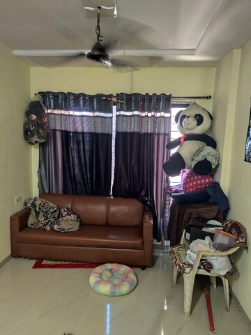 Living Room in 1 BHK Apartment at Rishabh Utopia, Bolinj – for Rent