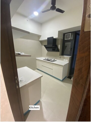 Kitchen in 3 BHK Apartment at Adani Oyster Greens, Sector 102 – for Rent