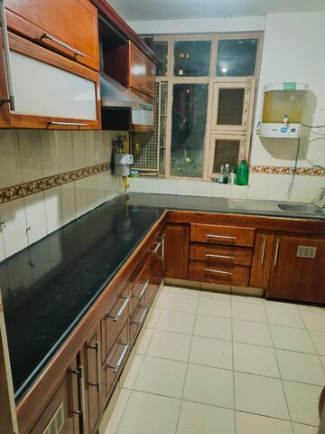 Kitchen in 2.5 BHK Apartment at Maple Heights, Sector 43 – for Rent