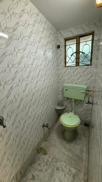 Bathroom in 2 BHK Apartment at Raj Nagar Extension – for Rent