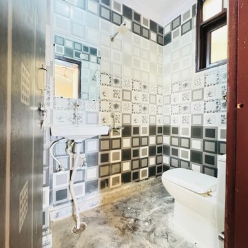 Bathroom in 1 BHK Apartment at Palm Residency Chhatarpur, Rajpur Khurd Extension – for Rent