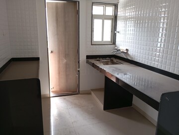 Kitchen in 1 BHK Apartment at Shree Venkatesh Graffiti Glover, Keshav Nagar – for Rent
