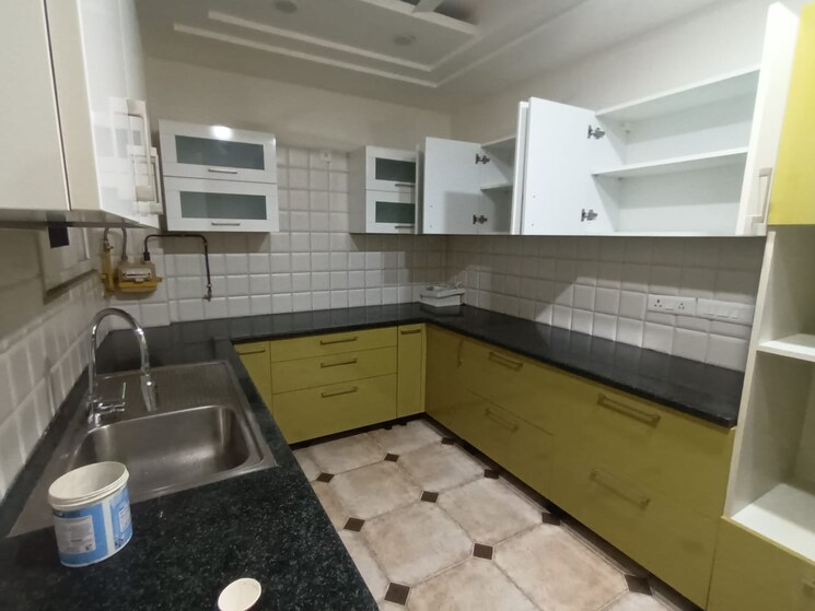 Kitchen, uday park 3 Bedroom 1500 Sq.Ft. Builder Floor In Uday Park Delhi 8274308