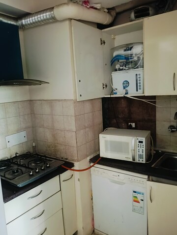 Kitchen in 1 RK Apartment at Golden Arcade Gurgaon, Sector 67 – for Rent
