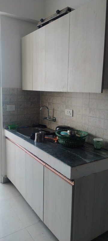 Kitchen in 4 BHK Apartment at Emaar Palm Terraces Select, Sector 66 – for Sale