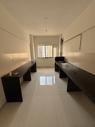 Kitchen in 3 BHK Apartment at Kalpataru Estate, Pimple Gurav – for Rent