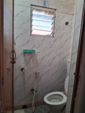Bathroom in 2 BHK Apartment at Raj Nagar Extension – for Sale