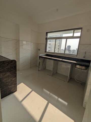 Kitchen in 1 BHK Apartment at Prayag Heights, Dindoshi – for Sale