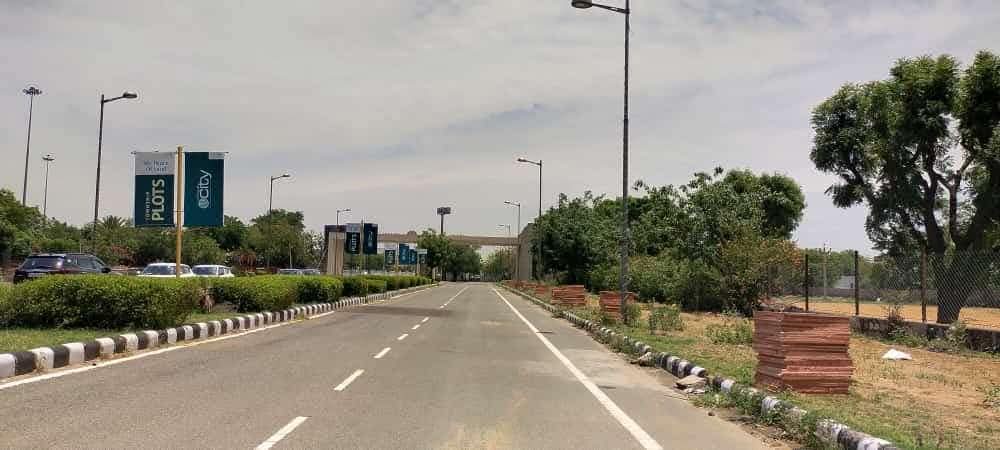 Plot For Sale in Unique City NRI Villas