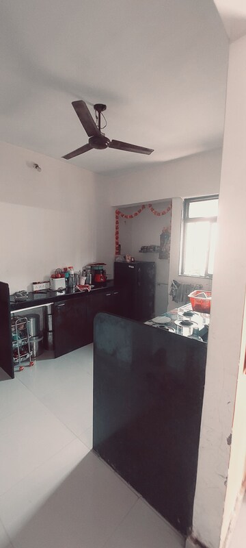 Kitchen in 1 BHK Apartment at Unique Nirmal Nagari, Khardipada – for Sale