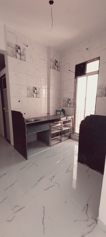 Kitchen in 1 BHK Apartment at Dombivli West – for Sale
