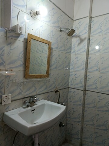 Bathroom in 2 BHK Apartment at Bana Enclave, Shipra Suncity – for Rent