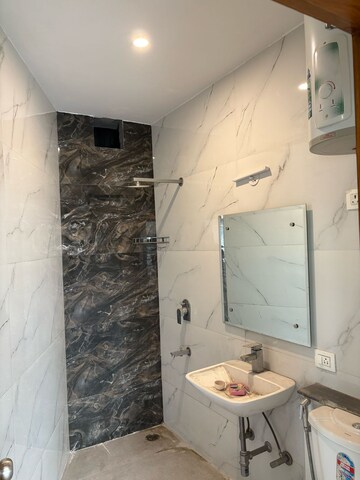 Bathroom in 3 BHK Builder Floor at DLF Moulsari Arcade, Sector 24 – for Rent