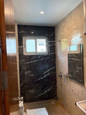 Bathroom in 3 BHK Builder Floor at DLF Moulsari Arcade, Sector 24 – for Rent
