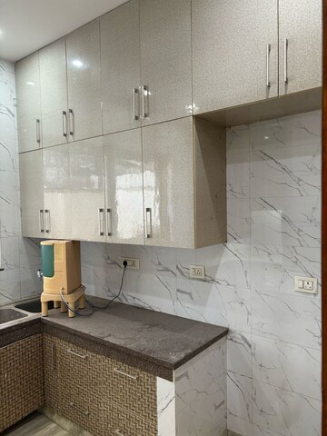 Kitchen in 3 BHK Builder Floor at DLF Moulsari Arcade, Sector 24 – for Rent