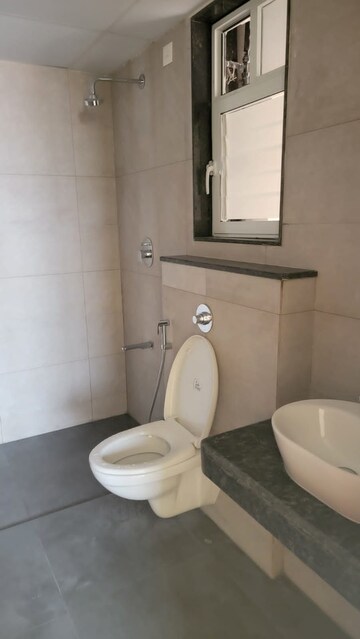 Bathroom in 2 BHK Apartment at K Raheja Reserve, Mohammadwadi – for Rent