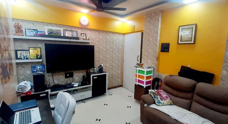 Living Room, atul-blue-empire 1 Bedroom 650 Sq.Ft. Apartment In Kandivali West Mumbai 8276531