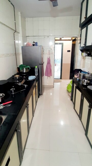Kitchen in 1 BHK Apartment at Atul Blue Empire, Kandivali West – for Sale