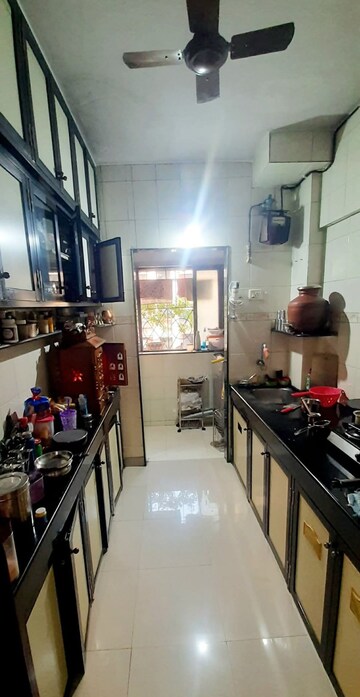 Kitchen in 1 BHK Apartment at Atul Blue Empire, Kandivali West – for Sale