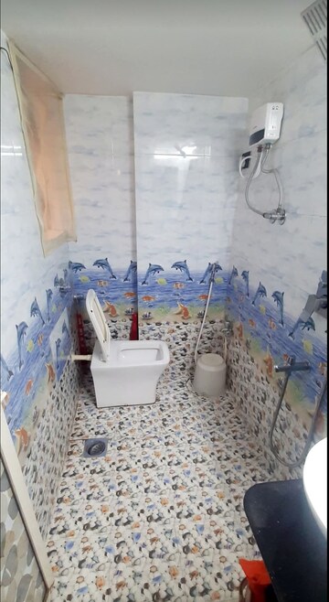 Bathroom in 1 BHK Apartment at Atul Blue Empire, Kandivali West – for Sale