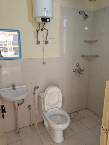 Bathroom in 2 BHK Apartment at Signature Orchard Avenue 2, Sector 93 – for Rent