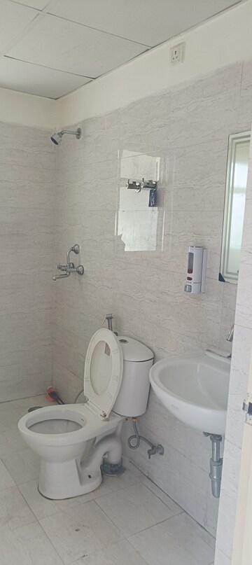 Bathroom in 2 BHK Apartment at MCC Signature Heights, Raj Nagar Extension – for Rent