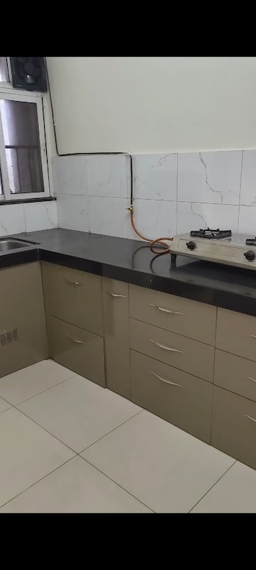 Kitchen in 2 BHK Apartment at Kolte Patil R10, Hinjewadi – for Rent