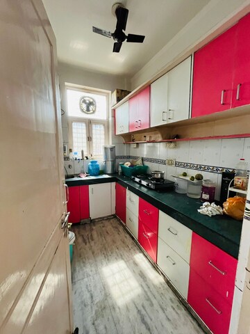 Kitchen in 2 BHK Apartment at Raj Nagar Extension – for Sale