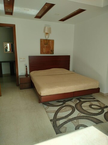 Bedroom in 3 BHK Builder Floor at Defence Colony – for Rent