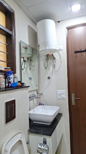 Bathroom in 3 BHK Builder Floor at Ansal Plaza Sector-23, Sector 23 – for Rent