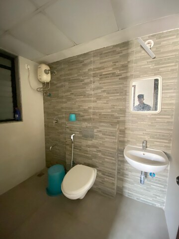 Bathroom in 1.5 BHK Apartment at Lodha Palava Downtown, Dombivli East – for Rent