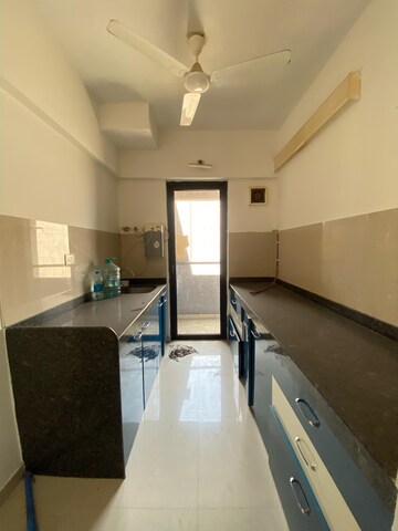 Kitchen in 1.5 BHK Apartment at Lodha Palava Downtown, Dombivli East – for Rent