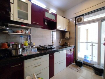 Kitchen in 2 BHK Apartment at Seawoods West – for Sale