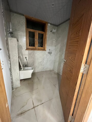Bathroom in 4 BHK Builder Floor at Dwarika Raj Garden City, Raj Nagar Extension – for Sale