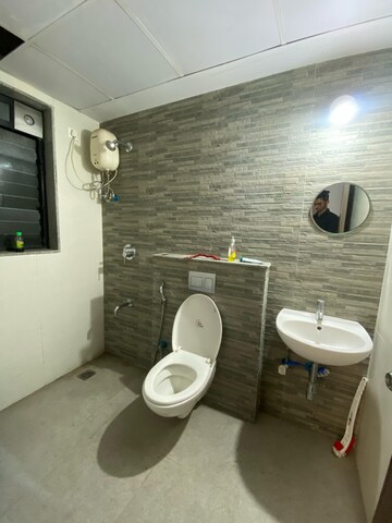 Bathroom in 1.5 BHK Apartment at Lodha Palava City Lakeshore Greens, Dombivli East – for Rent