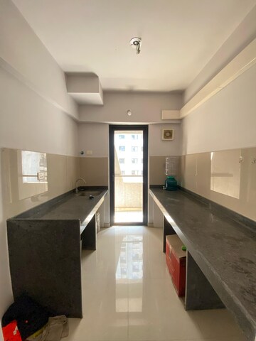 Kitchen in 1.5 BHK Apartment at Lodha Palava City Lakeshore Greens, Dombivli East – for Rent
