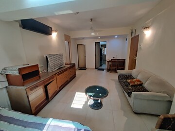 Living Room in 1 BHK Apartment at Firdaus CHS, Bandra West – for Rent