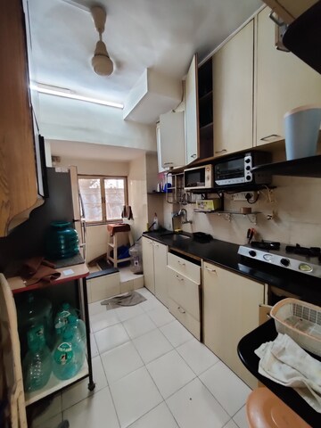 Kitchen in 1 BHK Apartment at Firdaus CHS, Bandra West – for Rent