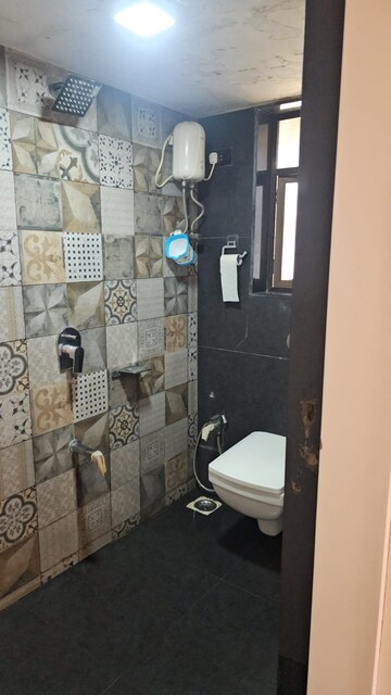 Bathroom in 2 BHK Apartment at JP Eminence, Andheri West – for Rent