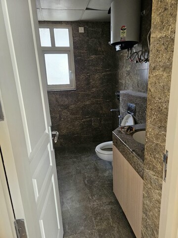 Bathroom in 3 BHK Apartment at Experion The Heart Song, Sector 108 – for Rent